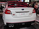 Rear view of the Subaru WRX STI S209, a high-performance variant of the Subaru WRX STI. This model was marketed exclusively in the United States. This particular image shows a white car with a small "S209" badge on the rear trunk lid.
