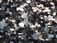Thin section of quartzite from Salangen, South Troms, Norway, showing elongate crystals associated with high strain regimes