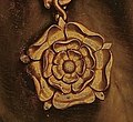 The Tudor rose used on the chain in the portrait of Sir Thomas More by Hans Holbein the Younger