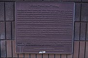 Dedication plaque on the stairway (now demolished) leading up to the basketball court at the former Chinese Playground