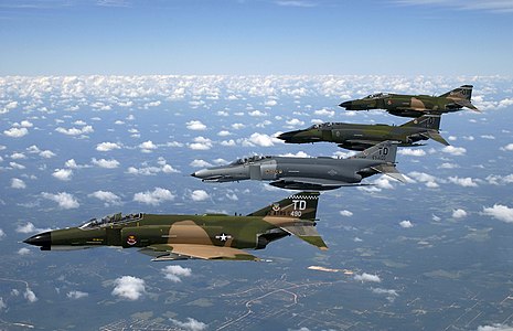 Formation of McDonnell Douglas F-4 Phantom II jets, by Michael Ammons (edited by Peripitus)