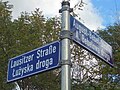 Signalisation bilingue en allemand et en sorabe d'une des plaques de voie dans l'agglomération de Cottbus.