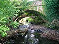 The 19th-century waggonway bridge (foreground) over the Lugton Water near Fergushill farm.