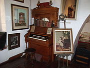 Early 19th-century organ in the main room of Squaw Peak Inn.