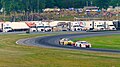 GT3 cars battle through "The Left Hander", turn 3, headed up towards Paul Newman Straight during an IMSA event at Lime Rock Park