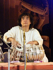 Zakir Hussain playing tabla.