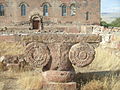 One of two capitals from the ruins just outside the church.
