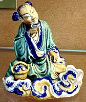 Ceramic statue of Tiên (Immortal) in a museum in Vietnam