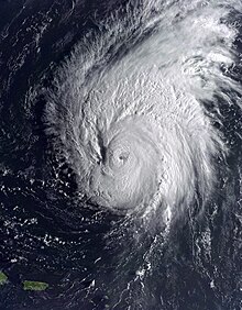 A view of Hurricane Erika from Space on September 8, 1997. The storm's eye, visible near the center of the image, is well-defined and representative of a strong hurricane. Puerto Rico and the Dominican Republic are seen to the southwest of Erika