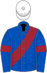 Royal blue, maroon sash and armlets, white cap