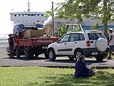 Cars wait to board the ferry at Mulifanua.