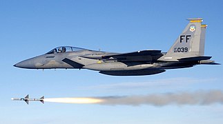 A USAF F-15C fires an AIM-7 Sparrow.