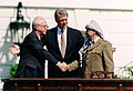 Image 101Israeli Prime Minister Yitzhak Rabin, United States President Bill Clinton, and Palestine Liberation Organization (PLO) Chairman Yasser Arafat during the signing of the Oslo Accords on 13 September 1993. (from 1990s)
