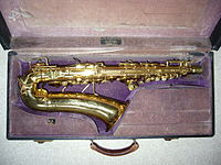 Conn 6M "Lady Face"[55] brass alto saxophone (dated 1935) in its original case