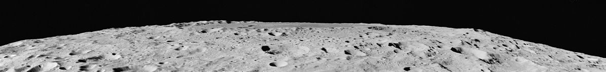 Oblique view from Apollo 16, with the mare at the horizon. The outer basin rings are subtle but visible in this view.