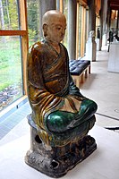 Stoneware statue of a luohan, Ming dynasty, 15th century CE, from China. The Burrell Collection, UK
