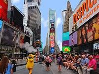 Times square with people sitting on a bench and a costumed character taking their character head off.