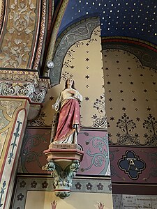 Statue sulpicienne de sainte Barbe en plâtre (XIXe siècle), avec sa palme du martyre et la tour, église Saint-Étienne à Romorantin, Loir et Cher, France.