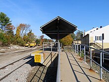 A small section of high-level railway platform