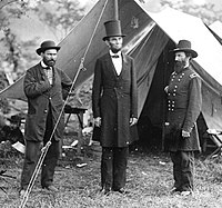 Abraham Lincoln (middle) in his distinctive "stovepipe" silk hat at Antietam, 1862