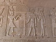 A Ptolemaic dynasty ruler with the cartouche "Ptolemy" before Sobek and Hathor, Kom Ombo.[16]