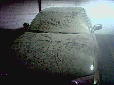 Reverse graffiti on a car