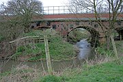 River Wiske flowing under the Wiske Railway Bridge. 54°25′44″N 1°22′16″W﻿ / ﻿54.428799°N 1.371070°W﻿ / 54.428799; -1.371070