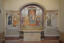 8. Asciano, antica Pieve di Sant’Ippolito, lungo al via Lauretana. Affresco di inizi XVI secolo raffigurante Madonna in trono con Bambino e Santi. Recenti ipotesi attribuiscono alla scuola umbra della bottega di Pinturicchio gran parte dell’affresco con presunto autoritratto dello stesso Raffaello Sanzio, nella figura del Sant’Ippolito.