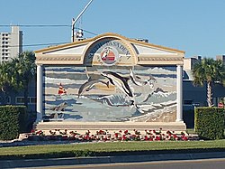 The welcome sign bearing the seal and motto of South Pasadena, Florida.