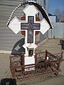 A memorial cross to the victims, raised in Militari, Bucharest, soon after the floods.