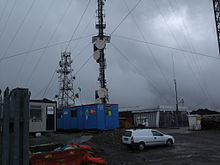 Base of Mast with Antennas and Comms Tower.