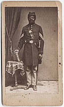 Sepia photo shows a black sergeant in Union Army uniform.