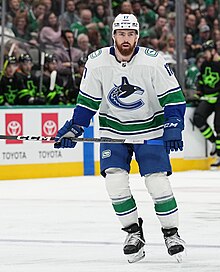 Hronek in a game against the Dallas Stars on 25 March 2023 at the American Airlines Center