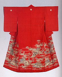 The back view of a scarlet red kimono with medium-length sleeves. The kimono has a warm red lining and a padded hem, and is decorated with three white crests and a hand-painted design of hazy mist, hanging scroll motifs and flowers.