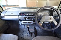 1992 Toyota Kijang SSX interior, with an aftermarket head unit and steering wheel cover