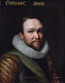 Head and shoulders portrait of a man in 17th century military attire. He wears a breastplate and a thick fur collar. He has a short brown beard and mustache and a very slight smile.