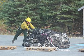 Helicopter Crewmember Tal Xavier Baker & Slingload of Gear at the Deshka Landing Fire