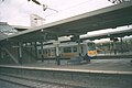 A Connex South Central British Rail class 319 EMU rips trough Bletchley station in 2000. It is operating a service from Gatwick Airport to Rugby, which usaly called at- Redhill, Croydon East, Kensington Olympia, Watford Junction and Milton Keyns Central on route.