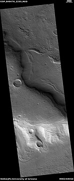 Glaciers moving form valleys in a mesa, as seen by HiRISE under HiWish program