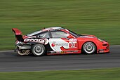 GMG Racing's Porsche 911 GT3 at Lime Rock Park in 2010