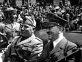 Image 6 Benito Mussolini and Adolf Hitler Photo credit: Eva Braun The two European Axis leaders during World War II, Benito Mussolini and Adolf Hitler, riding in an automobile, circa June 1940. This photo was found in Eva Braun's personal photo albums and is credited to her, though whether she was the true photographer is unknown. More featured pictures
