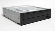 A standard optical drive, with a black bezel, not installed in a computer