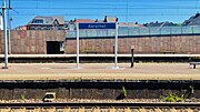 Place name sign on a platform