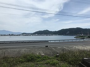 Yamagawa Bay and Japan National Route 269 from train on east side of Yamakawa Station.jpg