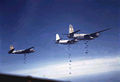 A flight of B-26 Bombers releasing their payloads.