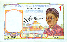 Un billet de banque portant la mention « une piastre », orné d'un dessin représentant une femme asiatique en habit traditionnel.