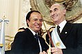 Outgoing President Carlos Menem with President–elect Fernando de la Rúa in 1999
