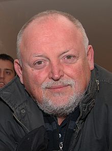 Fedor Frešo wearing black jacket and smiling at camera