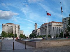 Looking southeast across Freedom Plaza towards Pennsylvania Avenue and the Old Post Office Building, with the United States Capitol in the background. (2009)