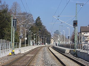 Double-tracked railway line with side platforms